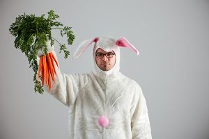 Man in Easter bunny costume.