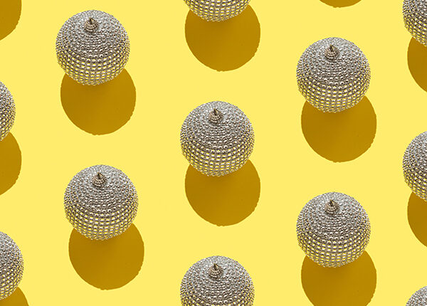 Baubles organized over yellow background