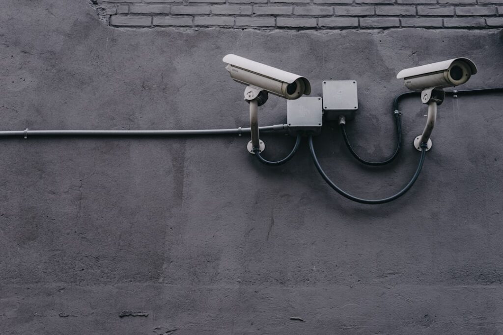 Security cameras on the side of a building.